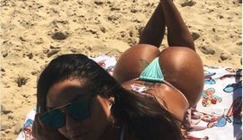 Mulher Melancia mostra corpaço na praia em dia de bronze