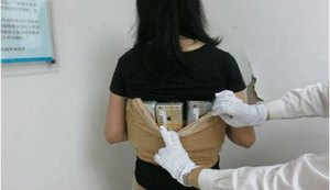 Mulher é detida na China com 102 iPhones presos ao corpo