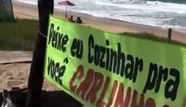 Mulher acampa em frente ao prédio de Carlinhos Maia com faixa: ‘Deixe eu cozinhar pra você’