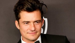 Orlando Bloom posa com o filho: 'Abriu meu coração'