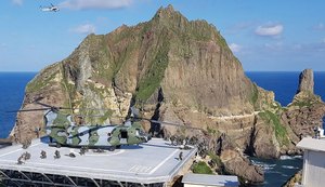 Equipes de resgate encontram helicóptero que caiu no Mar do Leste