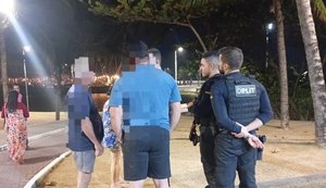 Homem é detido após surto e agressões contra familiares em área de praia