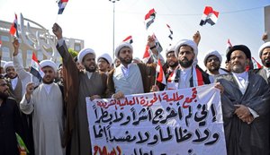 No Iraque, manifestantes desafiam toque de recolher